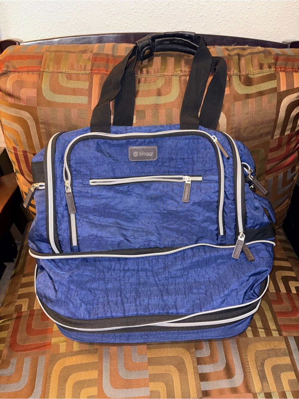 Biaggi Zipsak Boost Expandable Spinner Carry-On Bag – Navy Blue